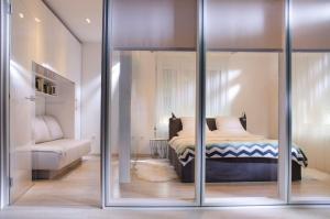 Posteľ alebo postele v izbe v ubytovaní Apartment Cubo Maksimir 1