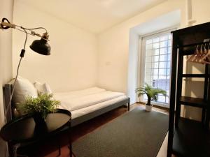 Posteľ alebo postele v izbe v ubytovaní Budget Apartment by Hi5- Károly 16