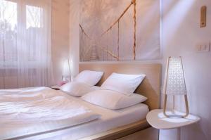 Posteľ alebo postele v izbe v ubytovaní Apartment Cubo Maksimir 1
