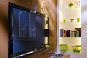 Televízia a/alebo spoločenská miestnosť v ubytovaní Apartment Cubo Maksimir 1