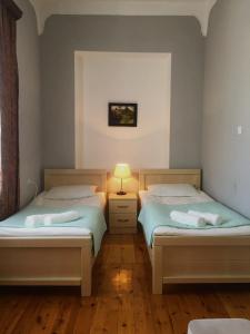 Voodi või voodid majutusasutuse Holiday House toas