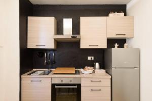 Kuchyň nebo kuchyňský kout v ubytování Casa Agata, accogliente appartamento nel centro storico + 14 fotografií