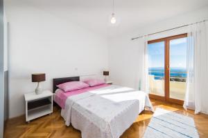 Ένα ή περισσότερα κρεβάτια σε δωμάτιο στο Apartment Biokovo