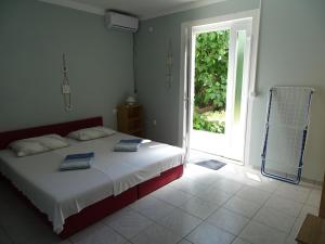 Postel nebo postele na pokoji v ubytování Apartment Lea