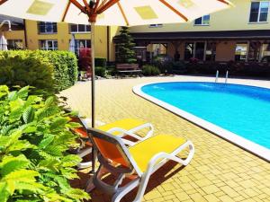 Bazén v ubytovaní Hotel Za Vodou alebo v jeho blízkosti