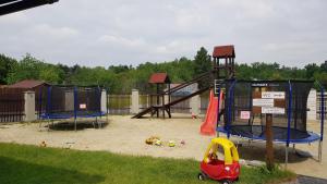 a park with a playground with a play set at Hotel U Jelena in Havířov