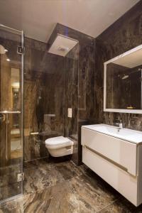 Koupelna v ubytování Hotel WOW