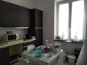 Kuchyňa alebo kuchynka v ubytovaní La mansarda sul Porto
