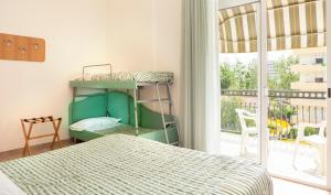 Postel nebo postele na pokoji v ubytování Hotel Caravel B&B + 37 fotografií