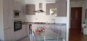 Kuchyňa alebo kuchynka v ubytovaní Residence Edera