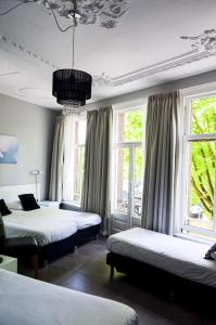 Postel nebo postele na pokoji v ubytování Family Hotel Kooyk + 37 fotografií