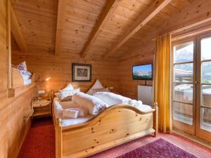 Ένα ή περισσότερα κρεβάτια σε δωμάτιο στο Chalets Berglehen