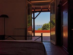 A bed or beds in a room at Villa Vittorio - Splendid panoramic sea view terrace