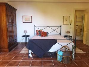 A bed or beds in a room at Villa Vittorio - Splendid panoramic sea view terrace