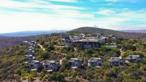 an aerial view of a house on a hill at Kuzuko Lodge in Addo