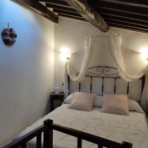 Voodi või voodid majutusasutuse La casa di Miri toas