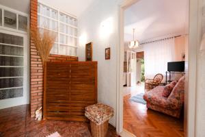 a living room with a couch and a chair at Apartment Nigra in Lovran