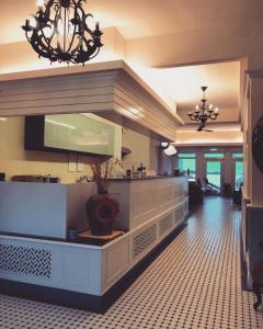 a large kitchen with a counter in a room at Chill Chill House in Shimen District