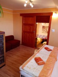A bed or beds in a room at Apartmán Slnečnica