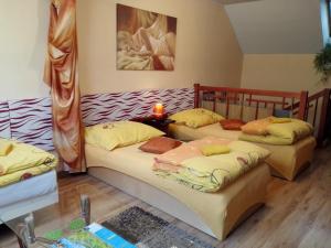 A bed or beds in a room at Apartmán Slnečnica