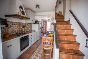 Køkken eller tekøkken på La Casita De Ana + 15 billeder