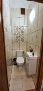 Koupelna v ubytování Apartament Orchidea