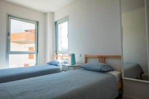 A bed or beds in a room at Viviendamedano Még 37 kép