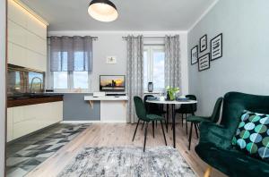 Kuchyňa alebo kuchynka v ubytovaní Apartament ProBaltica II Gdynia