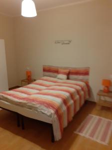 Katil atau katil-katil dalam bilik di Ferienhaus Puvogel