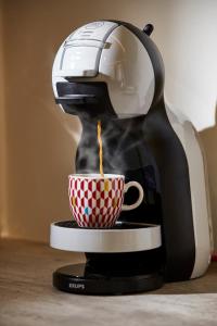 Coffee and tea making facilities at Old Athens style 1bdr with Acropolis view rooftop!