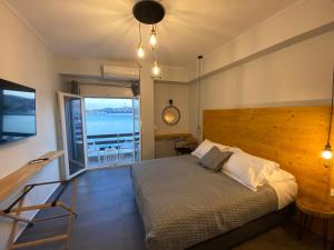 Postel nebo postele na pokoji v ubytování DIIO Suites
