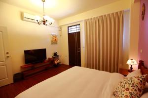 TV o dispositivi per l'intrattenimento presso 影拾光民宿Shadow of Light B&B