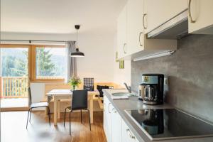 Kuchyňa alebo kuchynka v ubytovaní Spitalerhof Apartment & Sauna