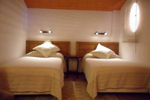 A bed or beds in a room at Magic Place