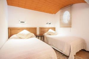 A bed or beds in a room at Magic Place Még 28 kép