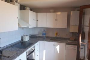 A kitchen or kitchenette at Magic Place