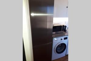 A kitchen or kitchenette at Magic Place