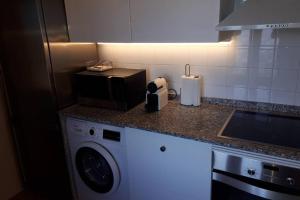 A kitchen or kitchenette at Magic Place
