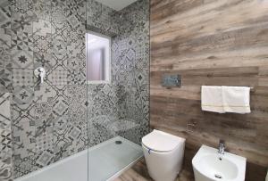 Kúpeľňa v ubytovaní Space Suite + 11 fotografií