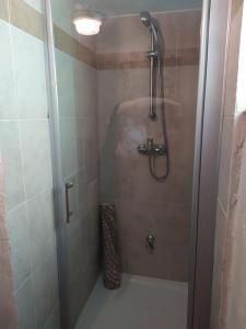a shower in a bathroom with a glass door at GA Grudzianka in Lwówek +53 photos