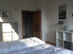 Postel nebo postele na pokoji v ubytování Auberge Tabarz Zimmerberg