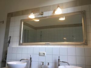 Koupelna v ubytování Auberge Tabarz Zimmerberg