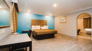 Postel nebo postele na pokoji v ubytování Executive inn Bacliff