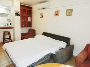 A bed or beds in a room at Rosesapparts Gran Via