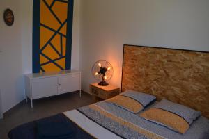 Posteľ alebo postele v izbe v ubytovaní L'indus