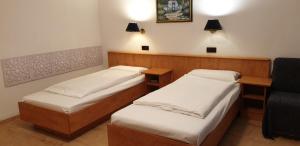 Uma cama ou camas num quarto em Hotel Gaya