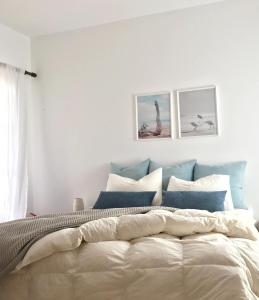 Letto o letti in una camera di Volta Superior Studios