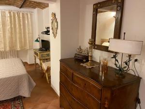 A bed or beds in a room at La Casa Di Ago