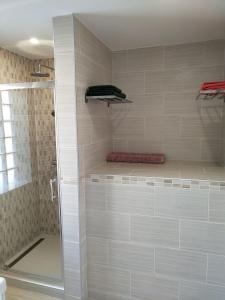 Ванная комната в Exclusive Beachfront Villa