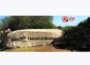 ヴィッラシミーウスにあるI Borghi di Michele - Il nido di Mennenneの岩の上のアメリカ水族館の看板